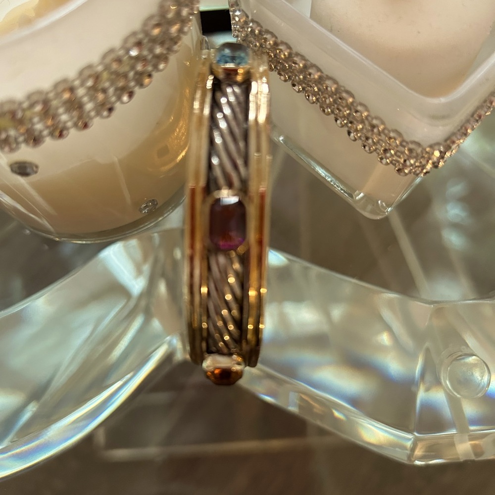 Clip on faux jeweled bracelet.